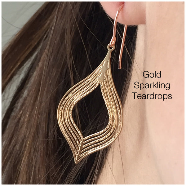 ‘Sparking Teardrops’ in gold.